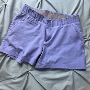 Women under armour shorts with button/zipper. Great for golf
